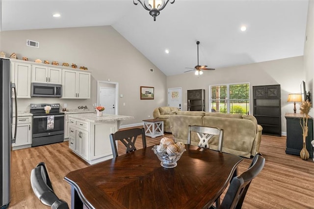 417 Beamer Rd SW, Calhoun, GA 30701 - dining space with high vaulted ceiling, ceiling fan, light wood-type flooring, recessed lighting, and baseboards