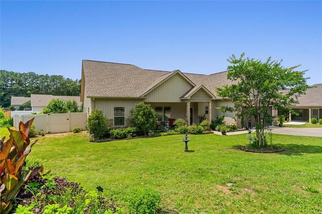 417 Beamer Rd SW, Calhoun, GA 30701 - view of front facade featuring roof with shingles, a gate, and concrete driveway