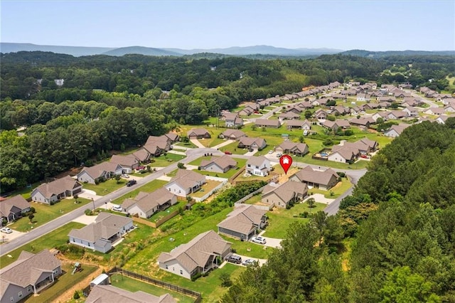 417 Beamer Rd SW, Calhoun, GA 30701 - aerial view of property's location featuring a heavily wooded area, nearby suburban area, and a mountain backdrop