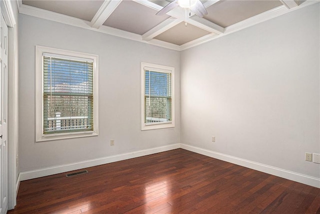 empty room with visible vents, coffered ceiling, and baseboards