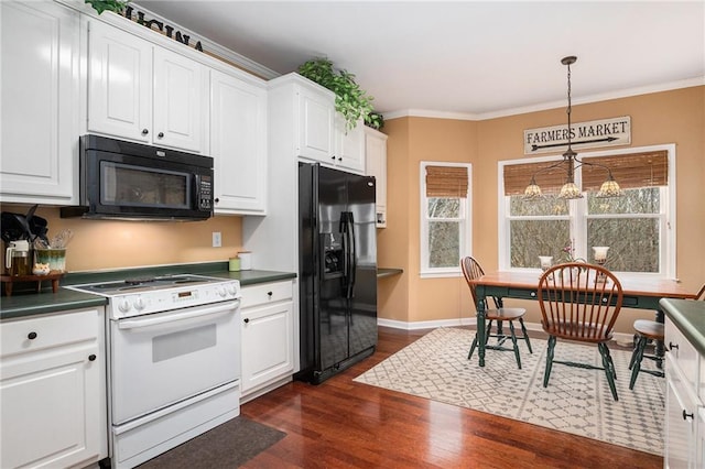 kitchen with dark countertops, black appliances, dark wood finished floors, ornamental molding, and white cabinetry