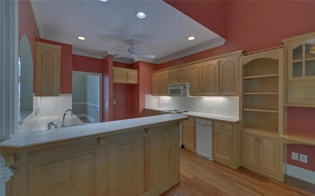 2121 Brittany Ct, Gainesville, GA 30506 - kitchen with white appliances, a peninsula, tasteful backsplash, a ceiling fan, and recessed lighting