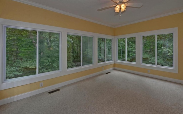 2121 Brittany Ct, Gainesville, GA 30506 - unfurnished sunroom featuring baseboards, plenty of natural light, carpet, and crown molding