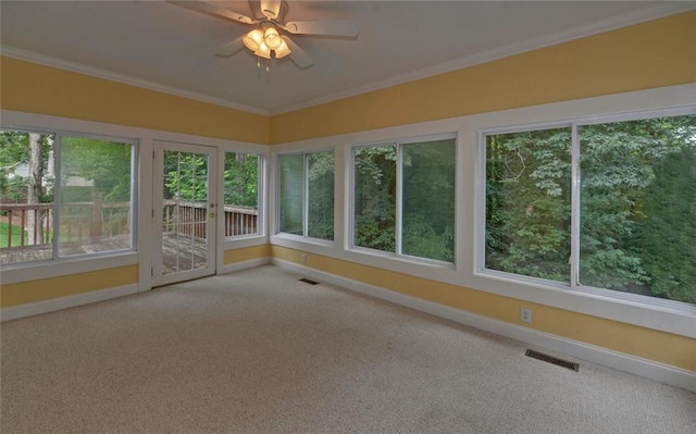 2121 Brittany Ct, Gainesville, GA 30506 - unfurnished sunroom with baseboards, crown molding, and carpet flooring