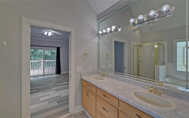 2121 Brittany Ct, Gainesville, GA 30506 - bathroom featuring ceiling fan, a shower stall, double vanity, lofted ceiling, and a bath