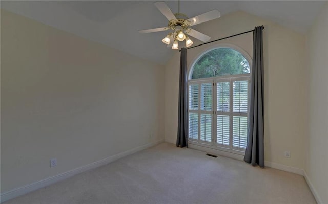 2121 Brittany Ct, Gainesville, GA 30506 - carpeted empty room with lofted ceiling, plenty of natural light, a ceiling fan, and baseboards