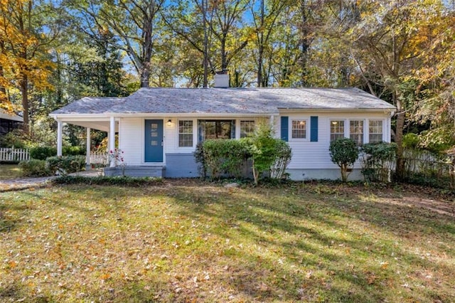 single story home with covered porch and a front lawn