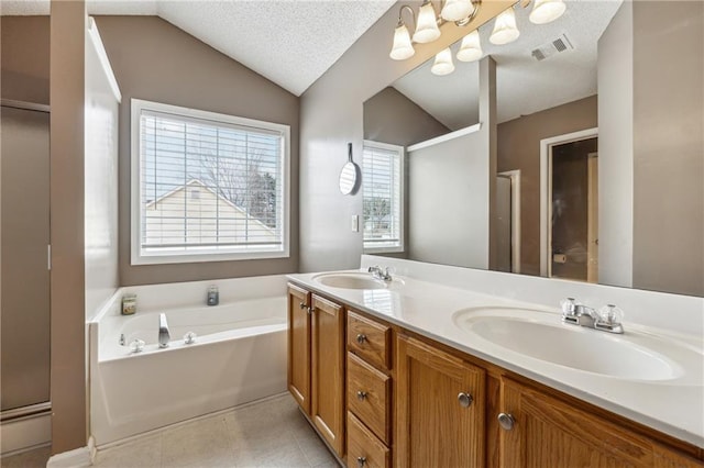 bathroom with lofted ceiling, tile patterned flooring, vanity, a textured ceiling, and independent shower and bath