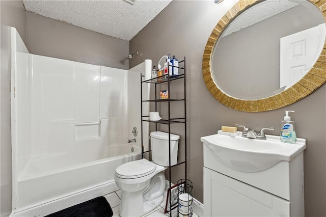 full bathroom with tile patterned floors, toilet,  shower combination, a textured ceiling, and vanity