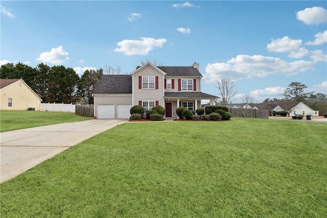 colonial house with a garage and a front lawn