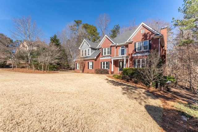 view of front of property with a front lawn