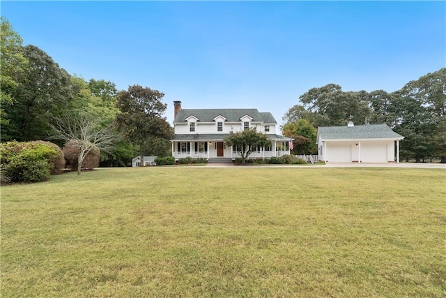 cape cod-style house featuring a front lawn and covered porch