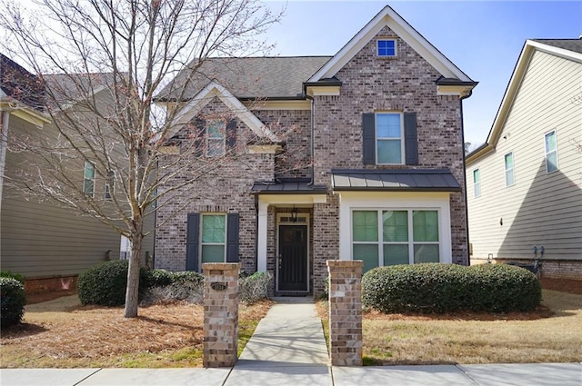 3534 S Sherwood Rd SE, Smyrna, GA 30082 - view of front of home with a standing seam roof, metal roof, and brick siding