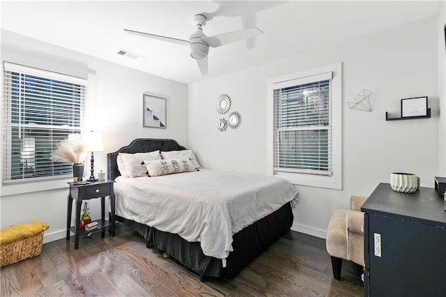 bedroom featuring dark hardwood / wood-style floors and ceiling fan