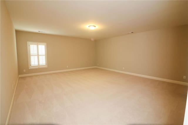 184 Cadence Trl, Canton, GA 30115 - spare room with baseboards and light colored carpet
