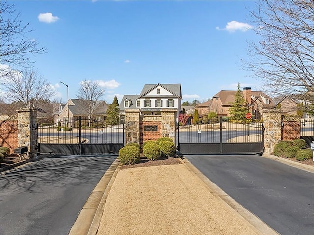 184 Cadence Trl, Canton, GA 30115 - gate featuring a residential view