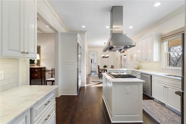 kitchen featuring crown molding, island range hood, white cabinets, stainless steel appliances, and dark wood-style flooring