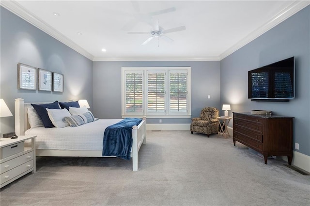 bedroom featuring baseboards, light carpet, ornamental molding, and a ceiling fan