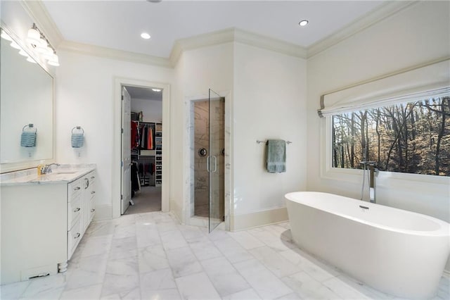 full bathroom with vanity, a stall shower, marble finish floor, and ornamental molding