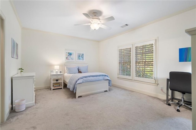 carpeted bedroom with baseboards, visible vents, and ornamental molding