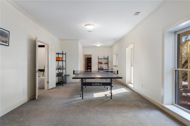 playroom with crown molding, baseboards, visible vents, and carpet floors