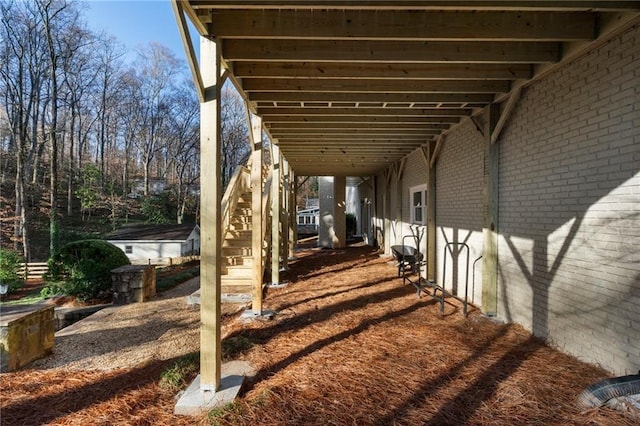 view of patio with stairway