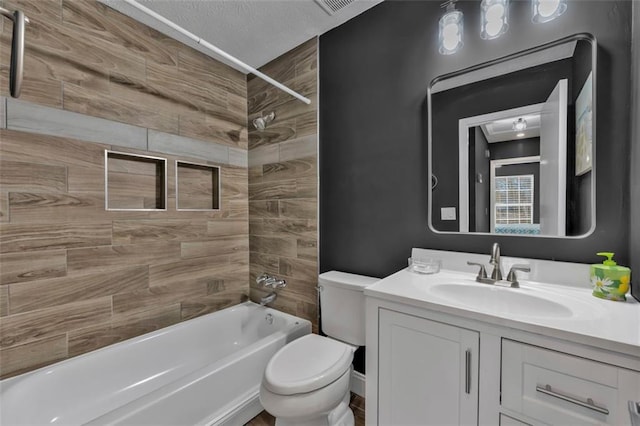 bathroom with  shower combination, vanity, and toilet