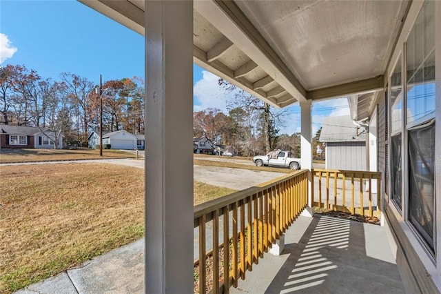 balcony with a porch and a residential view