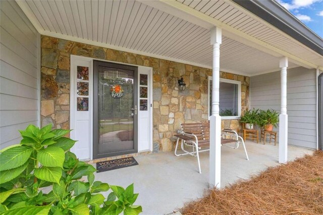 property entrance with a porch