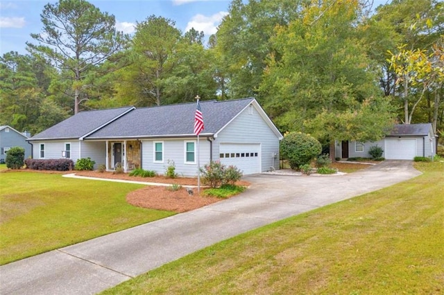 view of front of property with a front lawn and a garage