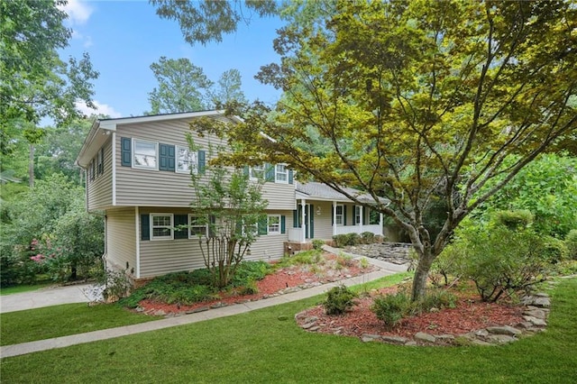 view of front of property with a front lawn