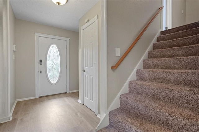 foyer entrance featuring light hardwood / wood-style flooring