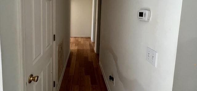 hall featuring dark wood finished floors