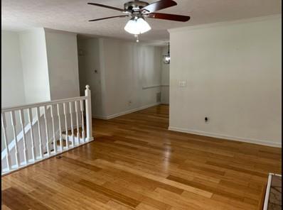 279 Fairview Dr, Dallas, GA 30157 - unfurnished room featuring ceiling fan, wood finished floors, and baseboards