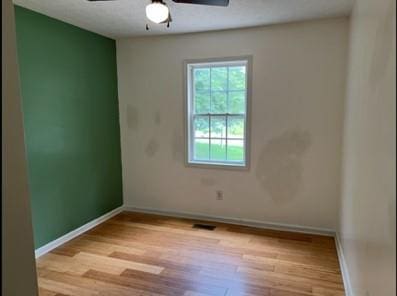 279 Fairview Dr, Dallas, GA 30157 - empty room with ceiling fan, wood finished floors, and baseboards