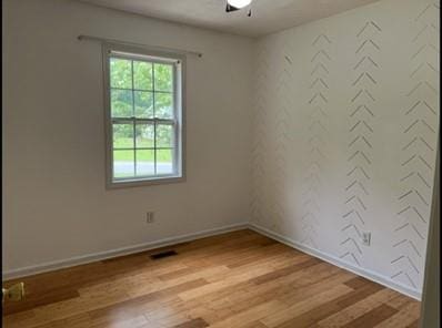 279 Fairview Dr, Dallas, GA 30157 - unfurnished room featuring wood finished floors, baseboards, and a ceiling fan