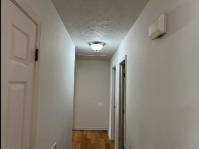 279 Fairview Dr, Dallas, GA 30157 - hall with a textured ceiling and wood finished floors
