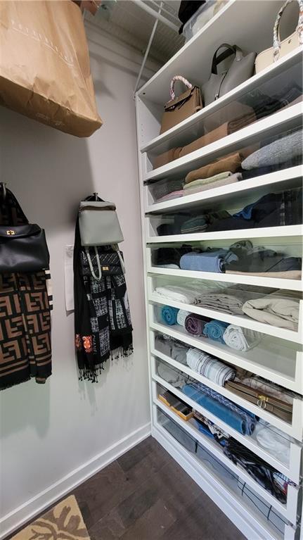 823 Canterbury Overlook, Atlanta, GA 30324 - spacious closet with dark wood-type flooring