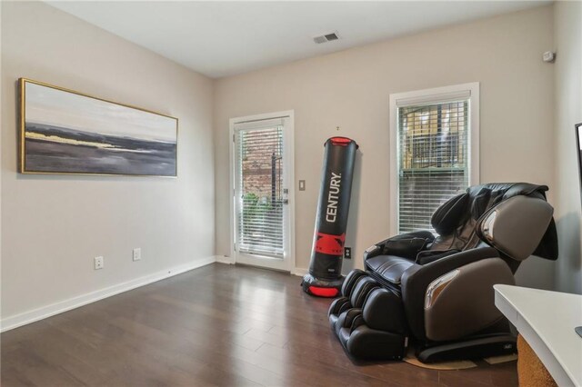 823 Canterbury Overlook, Atlanta, GA 30324 - living area featuring visible vents, baseboards, and wood finished floors