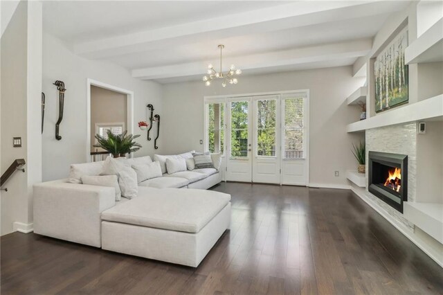 823 Canterbury Overlook, Atlanta, GA 30324 - living room with dark wood-style flooring, baseboards, a lit fireplace, a chandelier, and beamed ceiling