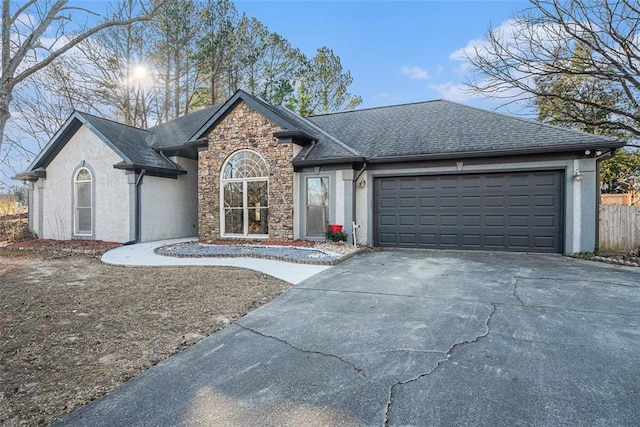 single story home featuring a garage