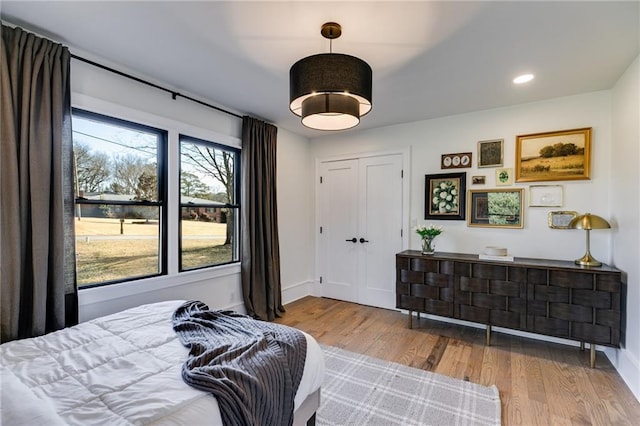 bedroom featuring hardwood / wood-style flooring