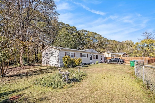 exterior space with a front yard