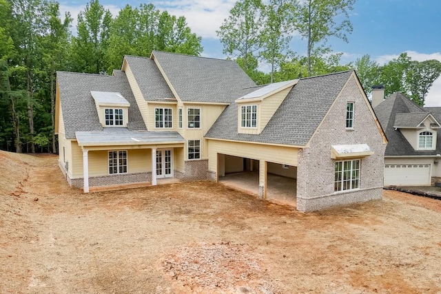 2163 Saddle Creek Dr, Jefferson, GA 30549 - view of front of house with dirt driveway, brick siding, and a shingled roof