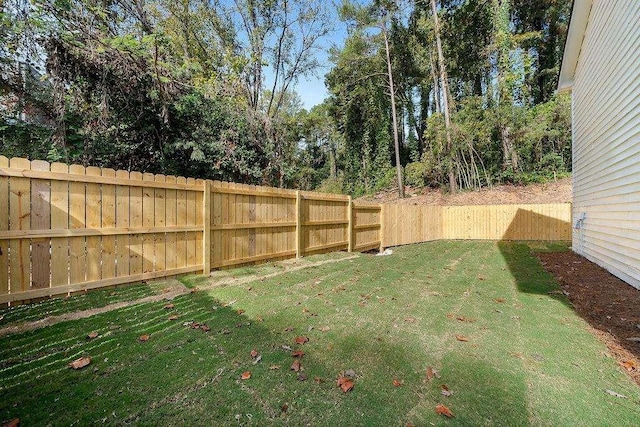 view of yard featuring a fenced backyard