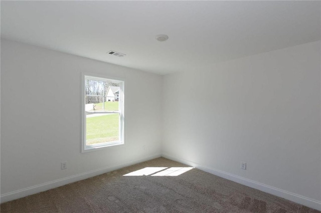 view of carpeted spare room