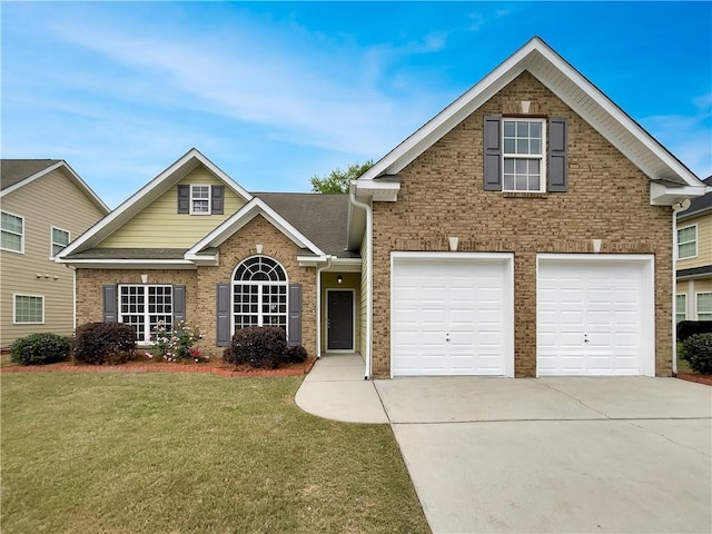 6405 Beaver Creek Trl, Atlanta, GA 30349 - traditional home with concrete driveway, brick siding, and a front yard