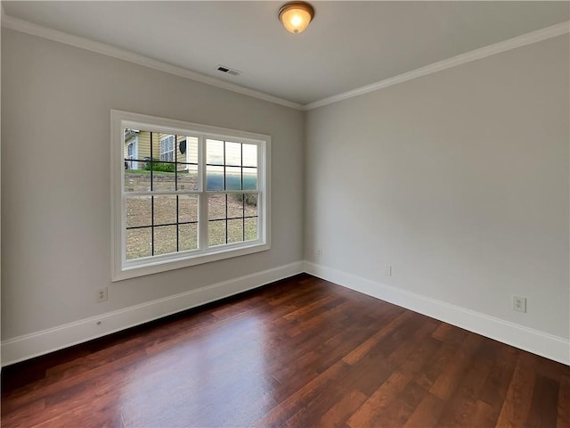 6405 Beaver Creek Trl, Atlanta, GA 30349 - unfurnished room with baseboards, visible vents, ornamental molding, and dark wood finished floors