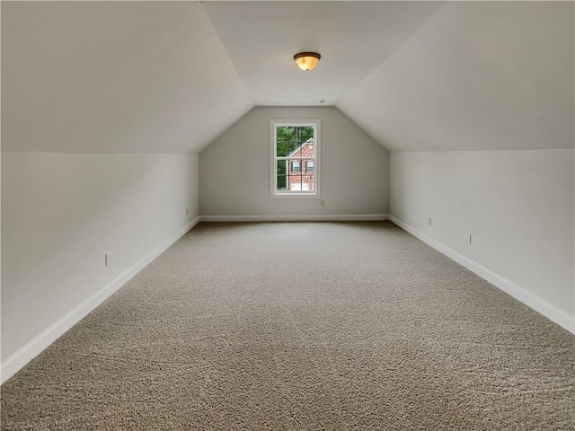 6405 Beaver Creek Trl, Atlanta, GA 30349 - bonus room with baseboards, carpet, and lofted ceiling