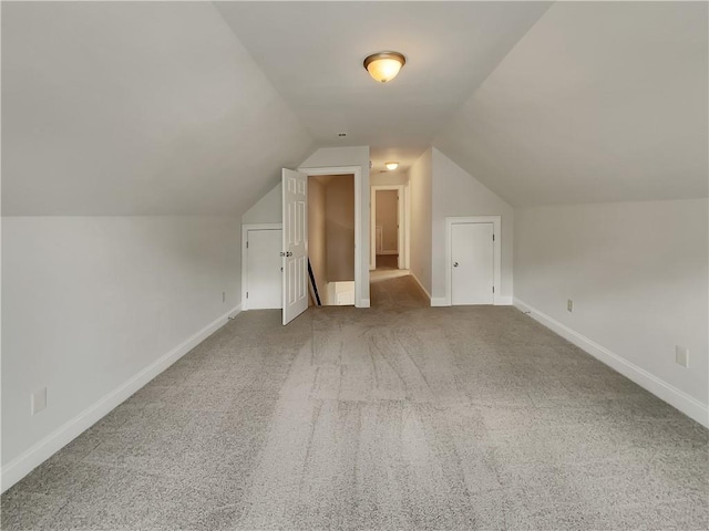 6405 Beaver Creek Trl, Atlanta, GA 30349 - additional living space with baseboards, carpet, and lofted ceiling